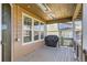Enjoy the fresh air on this cozy covered porch, complete with a grill at 15705 Red Deer Dr, Morrison, CO 80465