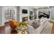 Inviting living room with a fireplace, plush seating, and elegant decor, perfect for relaxing at 6330 Montview Blvd, Denver, CO 80207