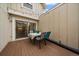 This cozy back patio features string lights, and outdoor seating at 6936 S Knolls Way, Centennial, CO 80122