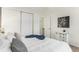 Comfortable bedroom with a sliding door closet and a neutral color scheme at 1100 S Waco St # G, Aurora, CO 80017
