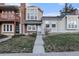 Charming home featuring a well-maintained lawn and inviting entrance for a warm welcome at 1100 S Waco St # G, Aurora, CO 80017