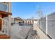 Covered pool, partially fenced backyard with patio at 7475 W Kentucky Ave, Lakewood, CO 80226