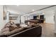 Spacious basement recreation area with sectional sofa and pool table at 7475 W Kentucky Ave, Lakewood, CO 80226