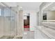 Elegant bathroom with walk-in shower and double vanity at 7475 W Kentucky Ave, Lakewood, CO 80226