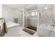 Luxurious bathroom with soaking tub and walk-in shower at 7475 W Kentucky Ave, Lakewood, CO 80226