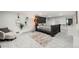 Spacious main bedroom with large bed, walk-in closet and sitting area at 7475 W Kentucky Ave, Lakewood, CO 80226