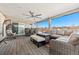 Spacious deck with comfortable seating and outdoor fireplace at 7475 W Kentucky Ave, Lakewood, CO 80226