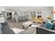Open concept living and kitchen area with modern finishes at 7475 W Kentucky Ave, Lakewood, CO 80226