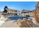 Inviting backyard pool with large deck and covered patio at 7475 W Kentucky Ave, Lakewood, CO 80226