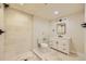 Modern bathroom featuring a walk-in shower, vanity with marble countertop, and updated fixtures at 1559 Apex Rd, Franktown, CO 80116