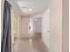 Basement hallway with access to patio and ample natural light at 10345 Lions Heart, Lone Tree, CO 80124
