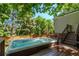 Relax in your own backyard hot tub surrounded by mature trees and a privacy fence at 10345 Lions Heart, Lone Tree, CO 80124