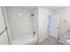 Clean bathroom features a tub and shower combo with new tile at 100 E Highline Cir # 307, Centennial, CO 80122