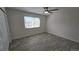 Bedroom with ceiling fan and view of neighborhood at 100 E Highline Cir # 307, Centennial, CO 80122