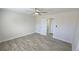 Bedroom features new flooring, ceiling fan, and closet at 100 E Highline Cir # 307, Centennial, CO 80122