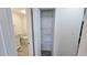 A pantry and partially-seen bathroom at 100 E Highline Cir # 307, Centennial, CO 80122