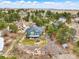 Aerial view of home with well-kept lawn, garden area, and fencing at 1330 Conifer Pl, Elizabeth, CO 80107