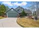 Charming two-story home showcasing a well-maintained yard and a two-car garage at 1330 Conifer Pl, Elizabeth, CO 80107