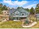 Large two-story home with a deck and lots of green space at 1330 Conifer Pl, Elizabeth, CO 80107