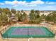 Overhead shot of a green and blue outdoor tennis court at 1330 Conifer Pl, Elizabeth, CO 80107