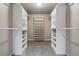 Walk-in closet with ample storage and shelving at 1330 Conifer Pl, Elizabeth, CO 80107