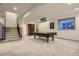 Finished basement featuring a pool table, carpeted floor, and staircase leading to the upper level at 13 Tamarade Dr, Littleton, CO 80127