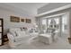 Comfortable sitting area in a large main bedroom featuring a bay window at 4220 S Yarrow Ct, Lakewood, CO 80235