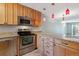Well-equipped kitchen with stainless steel appliances, modern cabinets, and granite countertops at 7474 E Arkansas Ave # 17-07, Denver, CO 80231