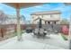 Enjoy a fenced backyard with a covered patio, perfect for outdoor gatherings and relaxation at 9844 Norfolk St, Commerce City, CO 80022
