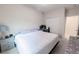 Bedroom featuring neutral walls and gray carpeted floor at 9844 Norfolk St, Commerce City, CO 80022