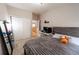 Bedroom featuring closet and a desk at 9844 Norfolk St, Commerce City, CO 80022
