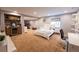 Spacious bedroom featuring a mini bar, recessed lighting, and access to a walk-in closet at 9844 Norfolk St, Commerce City, CO 80022