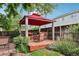 Backyard gazebo with outdoor seating offers a serene space for relaxation at 742 Mockingbird Ln, Brighton, CO 80601