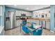 Bright kitchen with stainless steel appliances, granite countertops and light, neutral cabinets at 742 Mockingbird Ln, Brighton, CO 80601