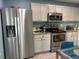 Well-equipped kitchen featuring stainless steel appliances, granite countertops, and ample cabinet space for modern living at 742 Mockingbird Ln, Brighton, CO 80601