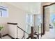 Bright foyer featuring a modern staircase and an abundance of natural light at 1768 Peak Loop, Broomfield, CO 80023
