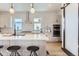 Well-equipped kitchen with modern appliances, ample counter space, and adjacent pantry for added convenience at 1768 Peak Loop, Broomfield, CO 80023