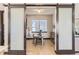 Bright office featuring a modern desk, stylish lamp, and views of the neighborhood at 1768 Peak Loop, Broomfield, CO 80023