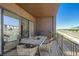 Inviting outdoor dining area on the patio with comfortable seating, perfect for entertaining at 1768 Peak Loop, Broomfield, CO 80023