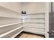 Walk-in pantry with ample shelving, ideal for organized storage and easy access at 1768 Peak Loop, Broomfield, CO 80023