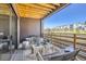 Charming patio with comfortable seating and a serene view of the surrounding neighborhood at 1768 Peak Loop, Broomfield, CO 80023