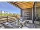 Cozy patio with stylish furniture, providing a comfortable outdoor space for relaxation and entertainment at 1768 Peak Loop, Broomfield, CO 80023