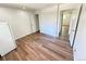 Cozy bedroom with vinyl plank flooring, ample closet space, and freshly painted walls at 9255 E Lehigh # 213, Denver, CO 80237