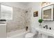 Charming bathroom with white marble tile in shower, stylish fixtures, and natural light at 2738 W 38Th Ave, Denver, CO 80211