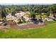 Aerial view of community park offering playgrounds, picnic spots, walking paths, and green spaces at 3024 S Sherman St, Englewood, CO 80113