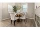 Dining room featuring round wooden table with seating for four at 3024 S Sherman St, Englewood, CO 80113