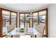 Cozy breakfast nook with marble table and beautiful views of the neighborhood at 4998 W 101St Ave, Westminster, CO 80031