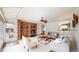 Spacious living room featuring a brick fireplace, plush seating, and lots of natural light at 4998 W 101St Ave, Westminster, CO 80031