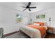 Bright bedroom with ample natural light, hardwood flooring, and modern decor at 5369 S Sherman St, Littleton, CO 80121