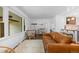 Cozy living room with hardwood floors, stylish seating, and natural light at 5369 S Sherman St, Littleton, CO 80121